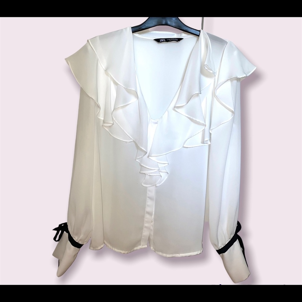 White long sleeve top